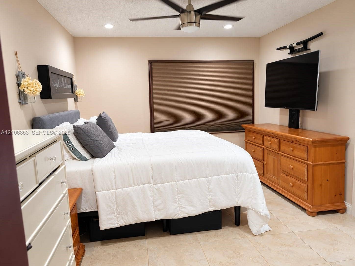 6331 Pinehurst Circle W, #C35, Tamarac, FL 33321 Neutral-toned walls featuring recessed lighting, a brushed-nickel ceiling fan, and tile flooring throughout