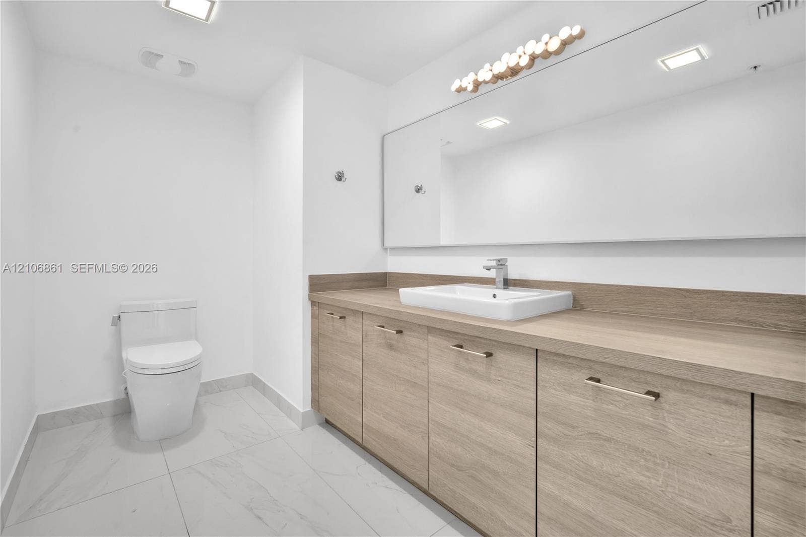 400 Sunny Isles Boulevard, #1519, Sunny Isles Beach, FL 33160 Third 1/2 Bathroom next to the kitchen