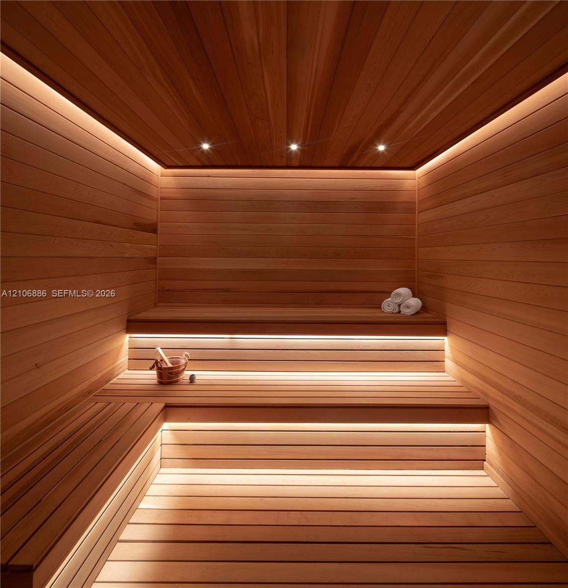 1400 Biscayne Boulevard, #2603, Miami, FL 33132 Custom-built sauna featuring tongue-and-groove wood paneling, multi-level tiered benches, recessed ceiling lighting, and integrated linear LED accent illumination