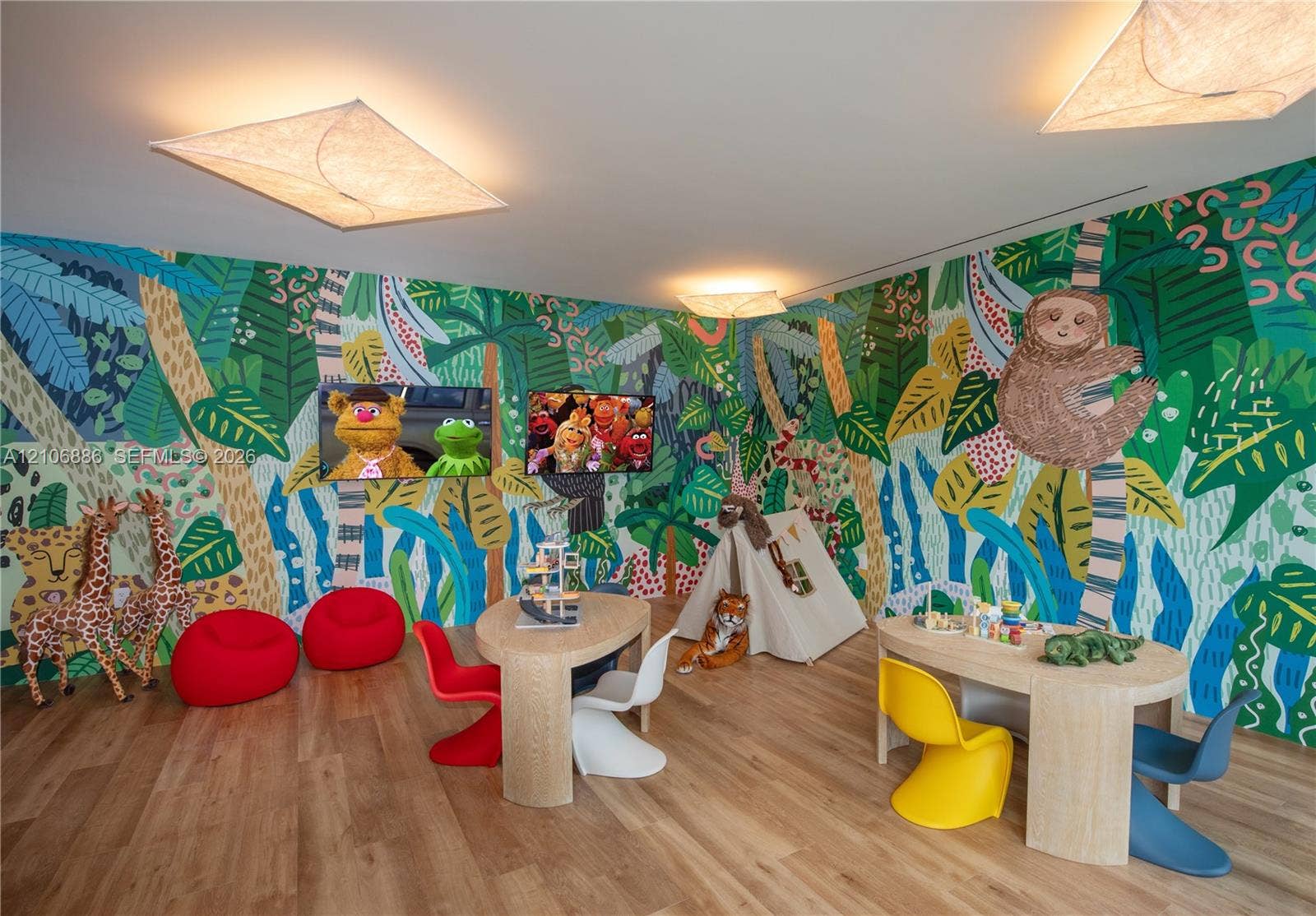 1400 Biscayne Boulevard, #2603, Miami, FL 33132 Interior room featuring wood-finish flooring, full-wall mural detailing, and recessed angular lighting fixtures