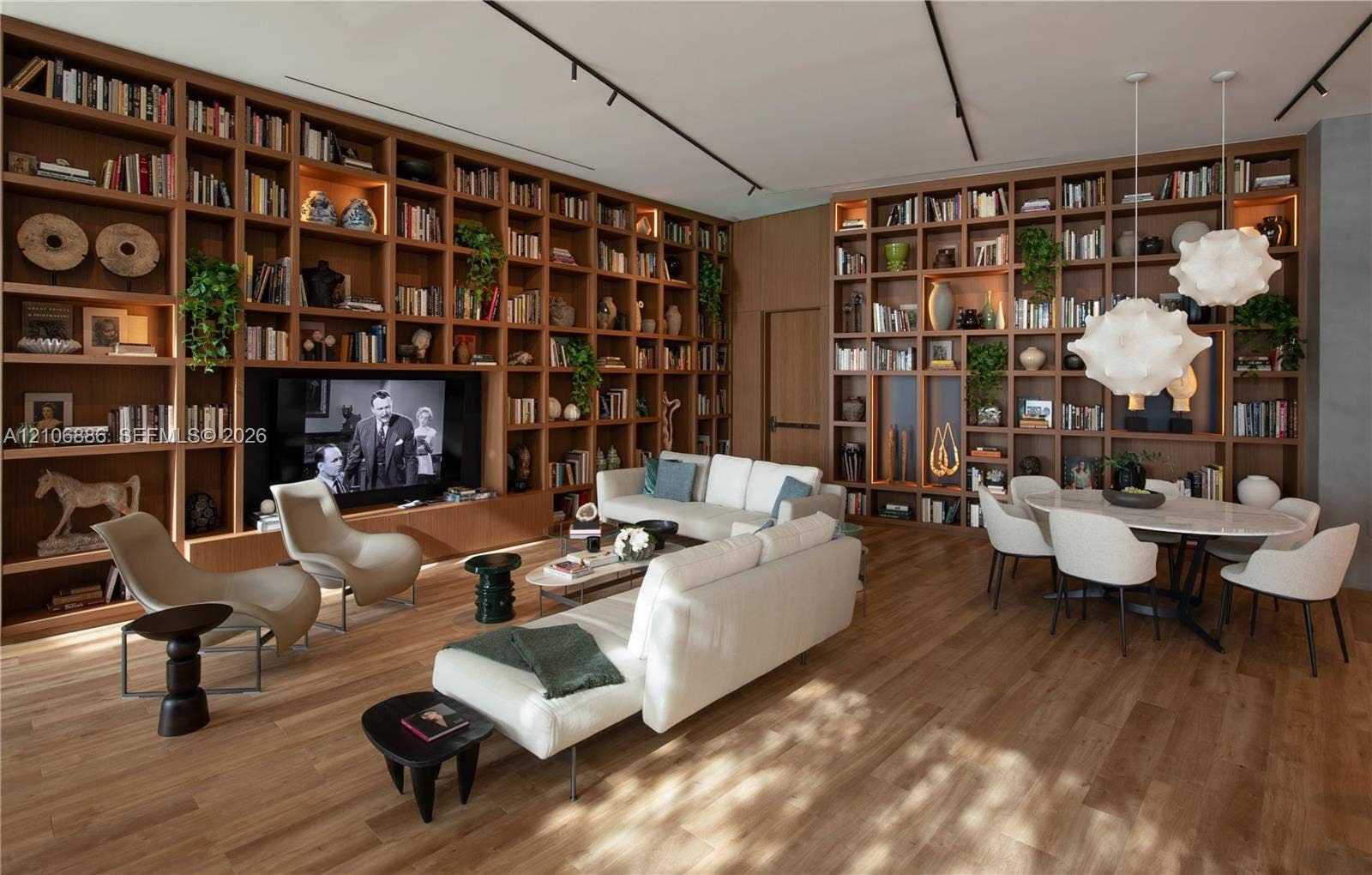 1400 Biscayne Boulevard, #2603, Miami, FL 33132 Floor-to-ceiling custom wood-finish built-in cabinetry, integrated linear ceiling lighting, and wood-finish flooring