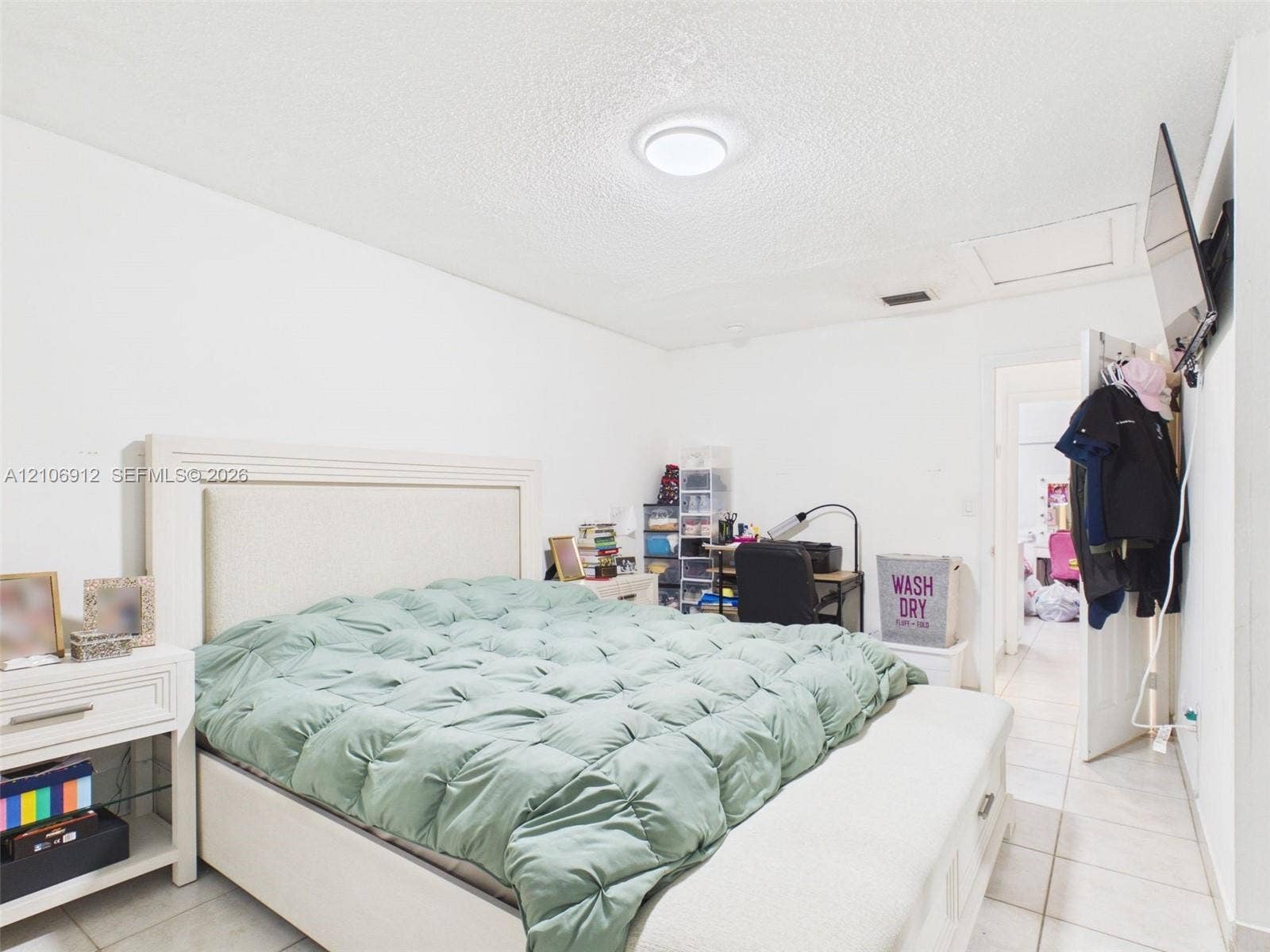 1142 W 42nd Street, #19, Hialeah, FL 33012 Neutral-toned tile flooring and ceiling-mounted flush lighting