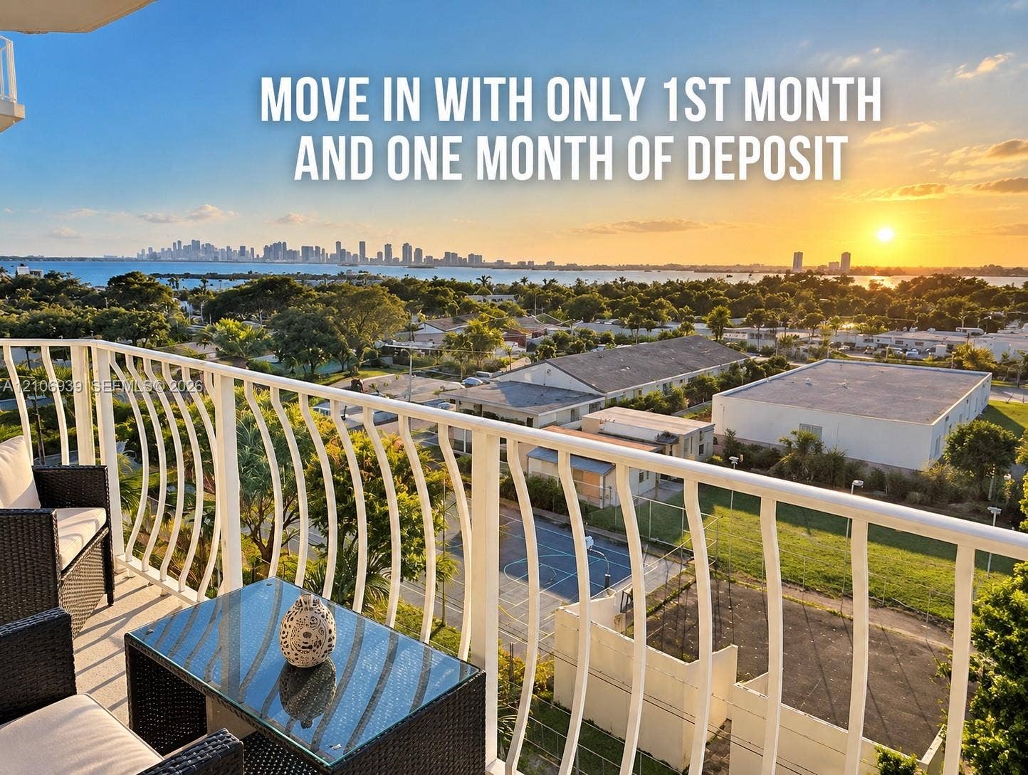 7601 E Treasure Drive, #802, North Bay Village, North Bay Village, FL 33141 Private balcony featuring a white metal railing and an expansive horizon line encompassing a coastal waterway and distant skyline
