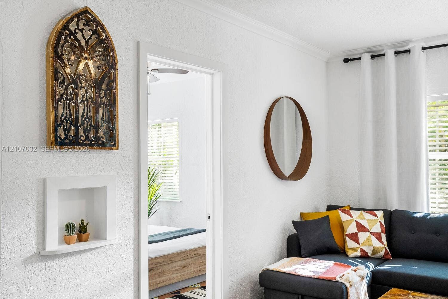 Recessed wall niche and white crown molding