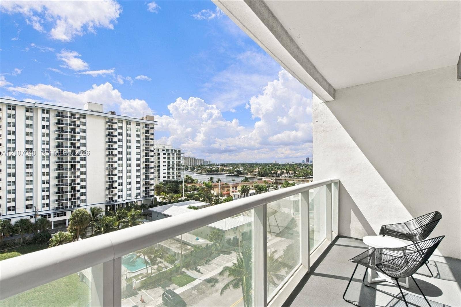 3101 Bayshore Drive, #707, Fort Lauderdale, FL 33304 Private balcony featuring a glass-panel railing and concrete flooring