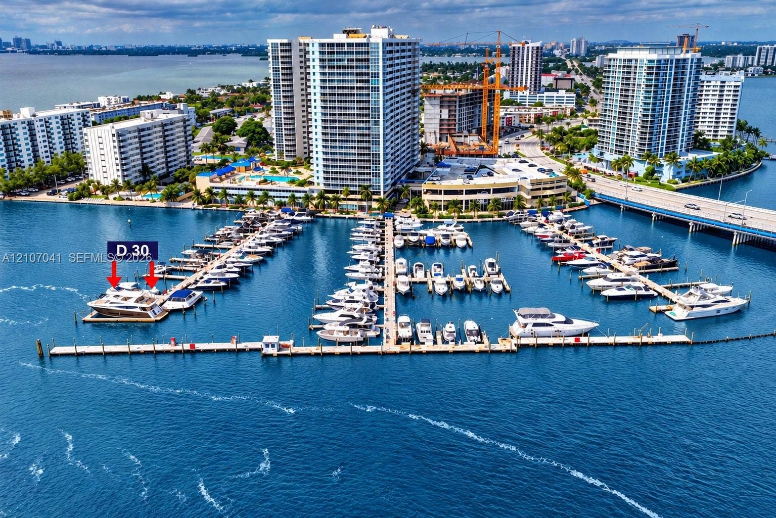 Deep-water marina slip designated as D30 featuring direct aquatic access and concrete dock construction