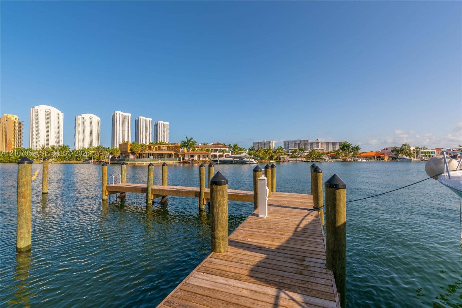 400 Sunny Isles Boulevard, #121, Sunny Isles Beach, FL 33160 Waterfront wood-plank dock with integrated mooring pilings