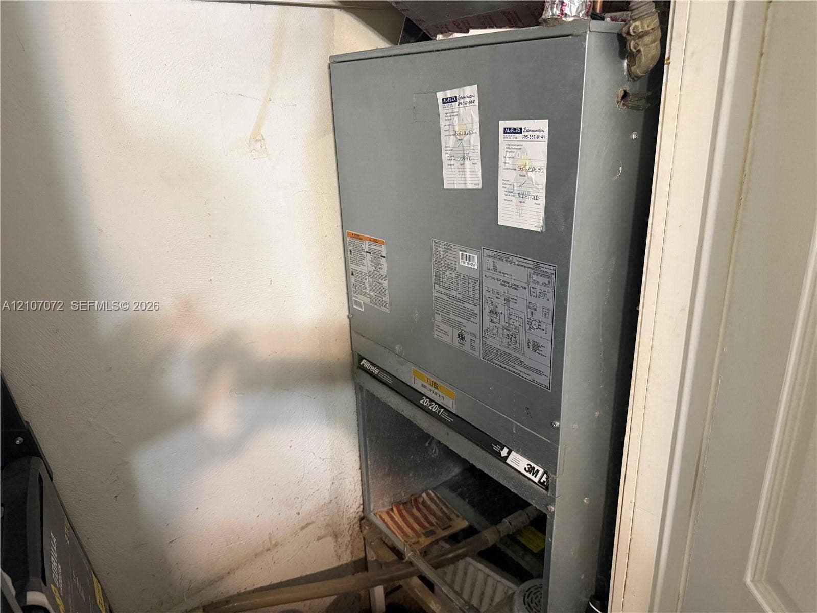 Climate control unit featuring a metal housing cabinet and built-in air filtration system