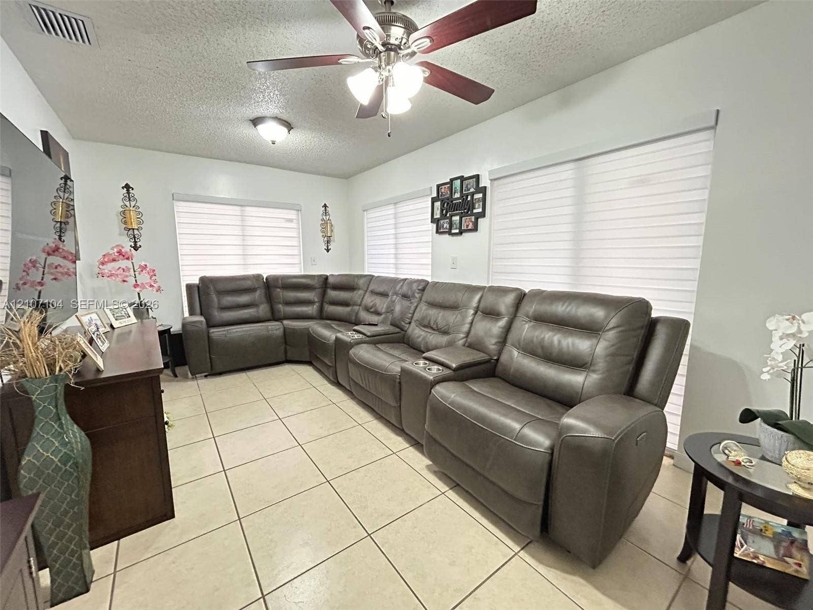16259 SW 306th Street, #0, Homestead, Homestead, FL 33033 Neutral-tone ceramic tile flooring, multi-speed ceiling fan with integrated lighting, recessed lighting, and sheer roller shades