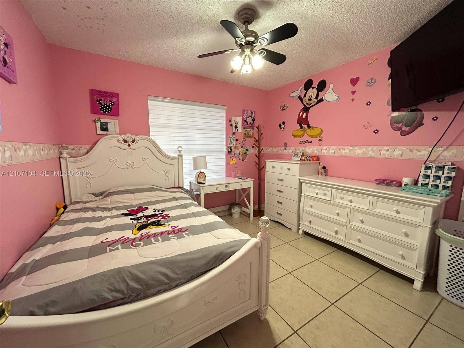 16259 SW 306th Street, #0, Homestead, Homestead, FL 33033 Room featuring neutral tile flooring, window with horizontal blind, and a central ceiling fan with integrated light fixture