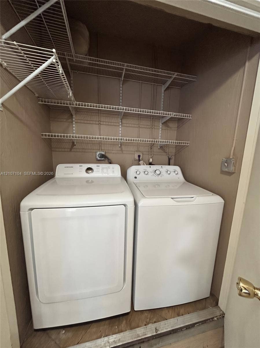 16259 SW 306th Street, #0, Homestead, Homestead, FL 33033 Laundry closet featuring three tiers of wire shelving and dedicated utility connections