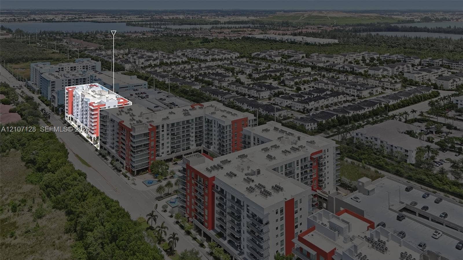7875 NW 107th Avenue, #802, Doral, Doral, FL 33178 Multi-story residential complex featuring private balconies, architectural masonry, and perimeter landscaping