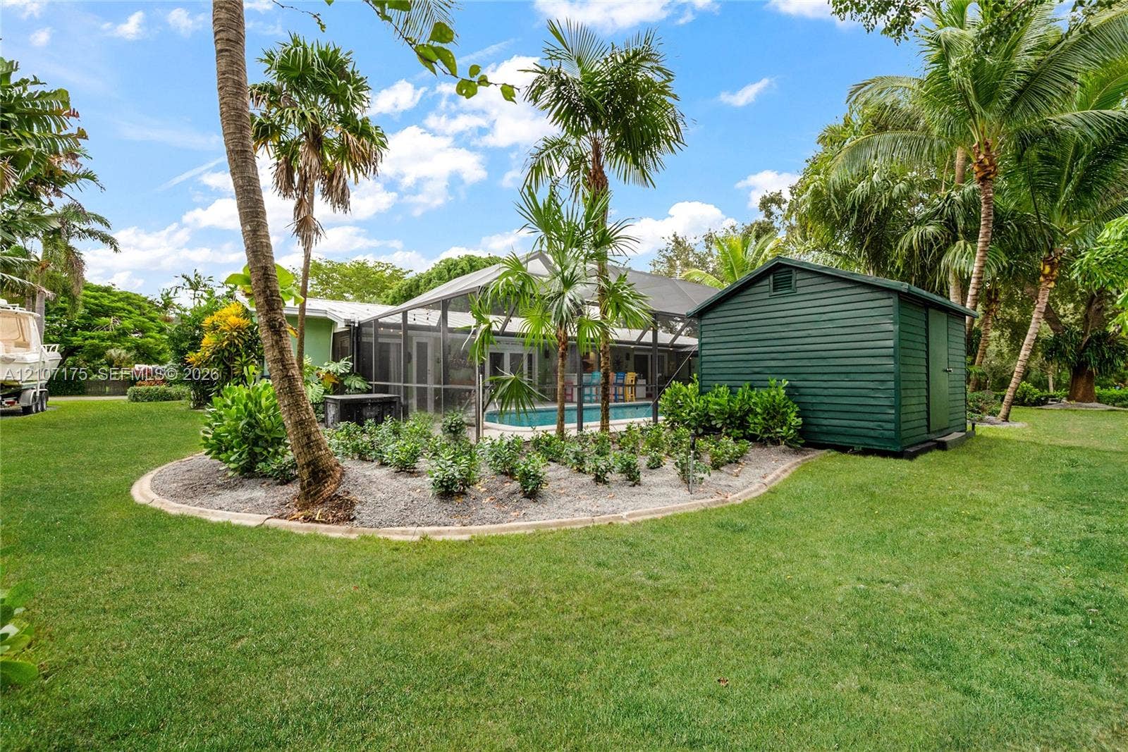 17550 SW 86th Avenue, Palmetto Bay, FL 33157 Lush yard and storage one of 2 sheds.
