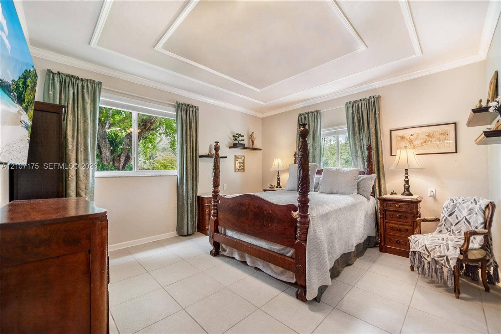 17550 SW 86th Avenue, Palmetto Bay, FL 33157 4th Bedroom en-suite could be used as 2nd primary, guest, inlaw or home office. Tray ceiling featuring decorative crown molding, large-format tile flooring, and dual closets.