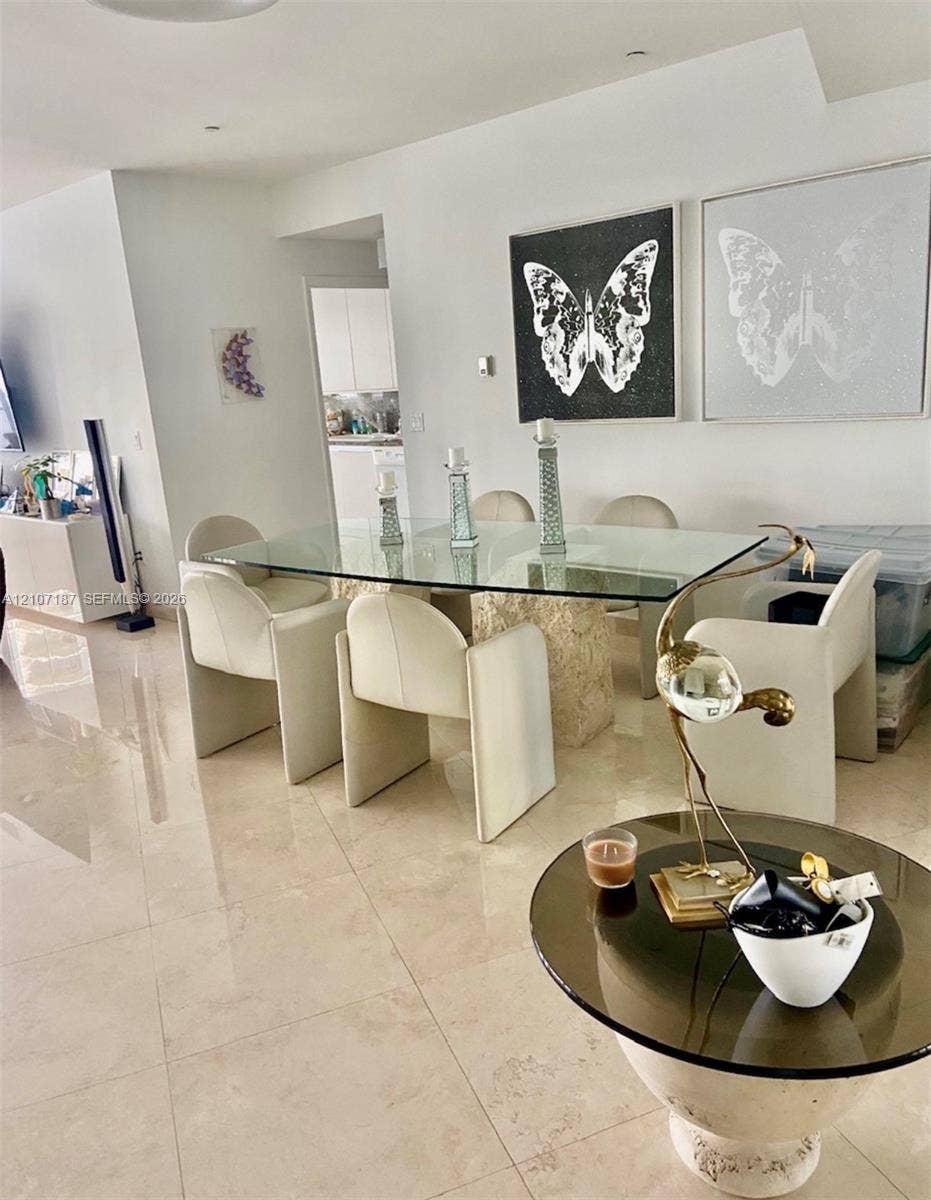 9601 Collins Avenue, #403, Bal Harbour, FL 33154 Polished stone flooring throughout and recessed ceiling lighting