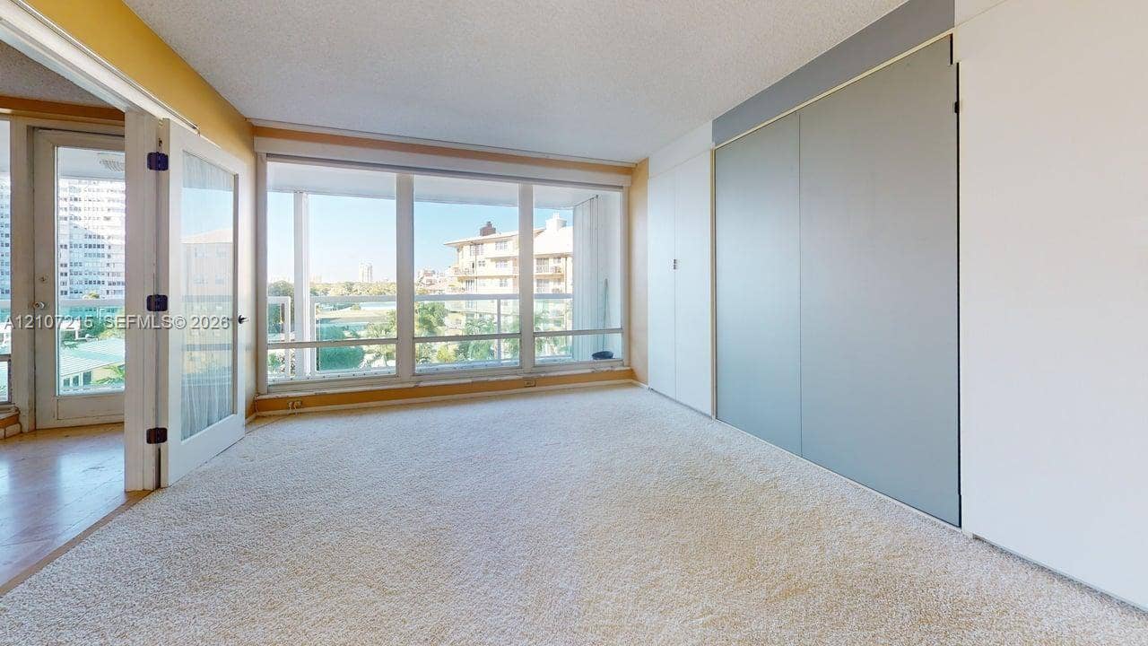 2100 S Ocean Lane, #303, Fort Lauderdale, FL 33316 2nd bedroom with Murphy bed wall unit