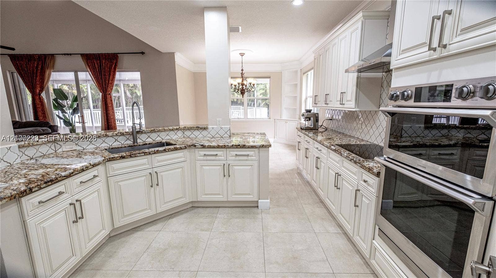 5280 NW 95th Avenue, Coral Springs, Coral Springs, FL 33076 Kitchen featuring white cabinetry, stone-finish countertops, tile backsplash, built-in double ovens, and tile flooring