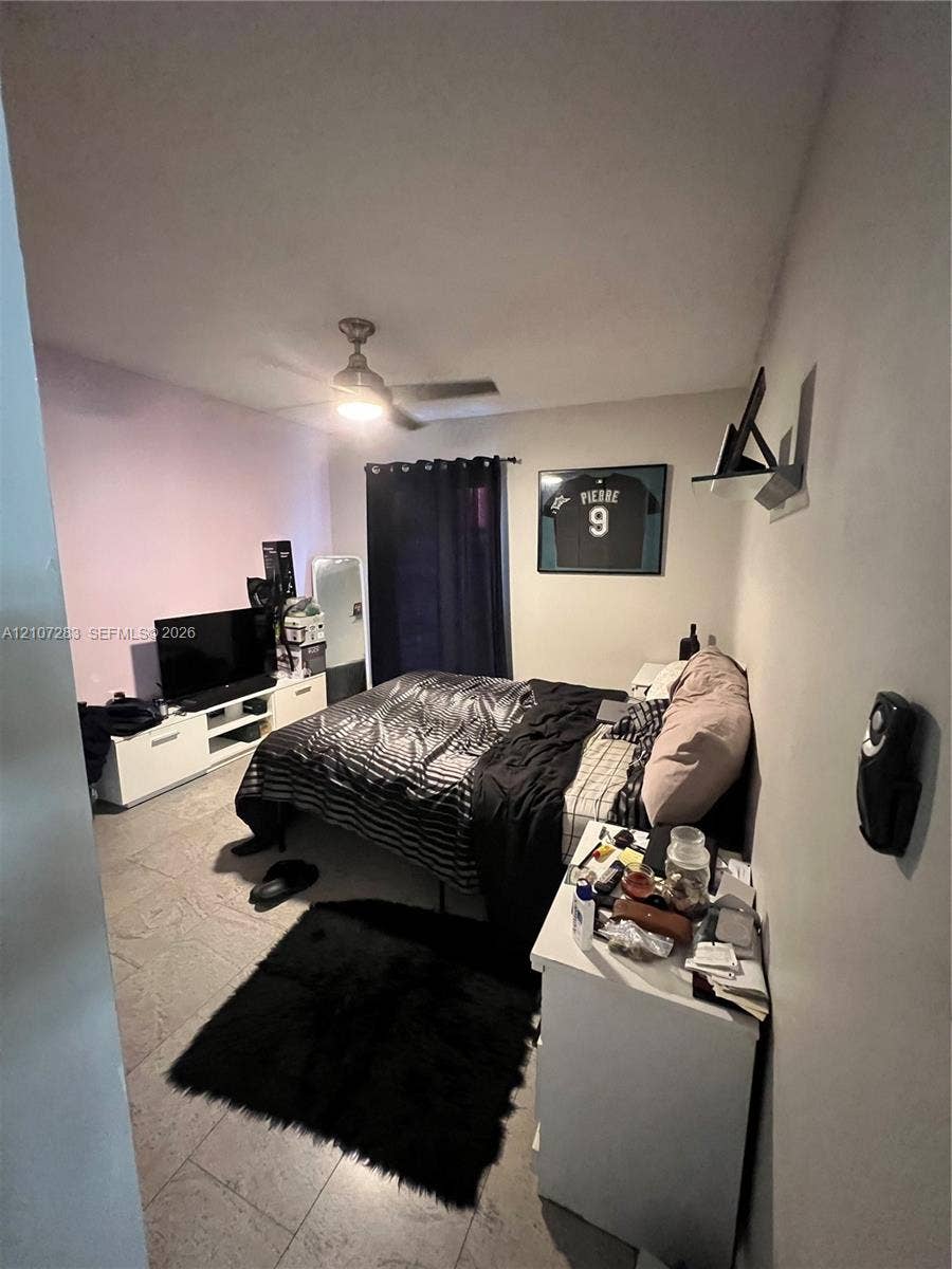 3301 Raleigh Street, #4E, Hollywood, FL 33021 Tile flooring and ceiling-mounted light fixture with integrated fan