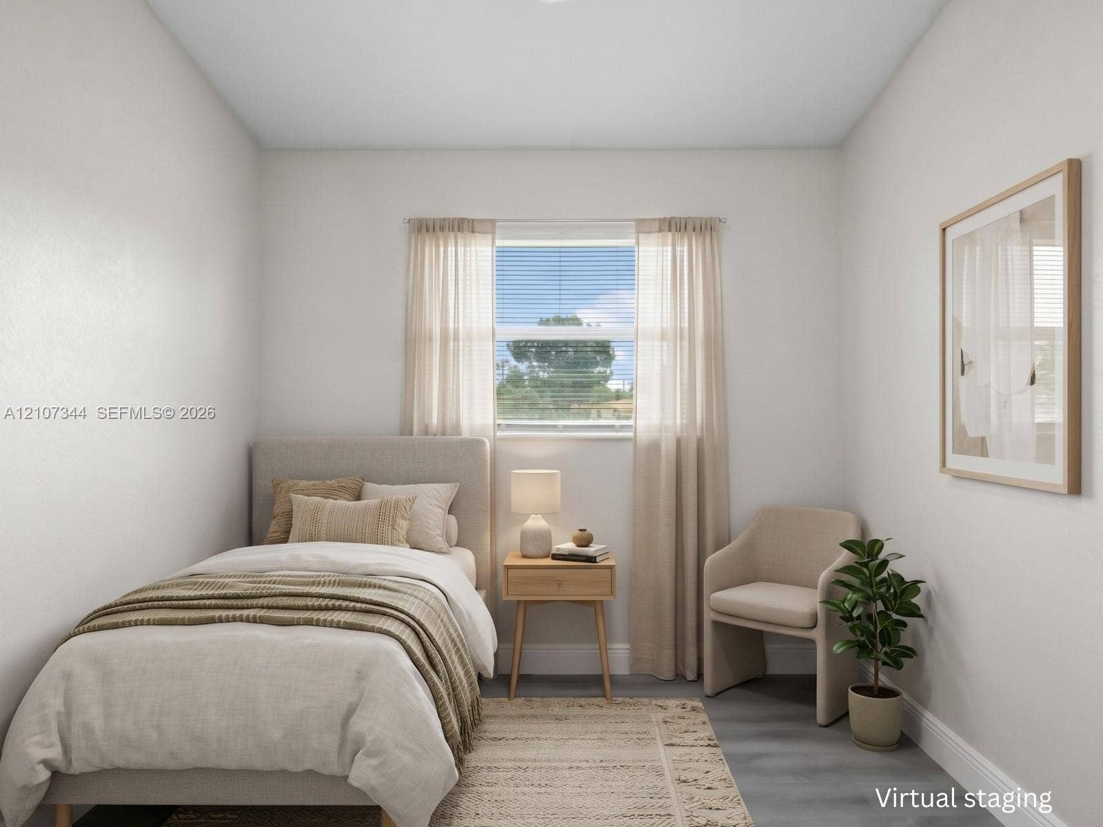 Neutral interior space featuring smooth walls, wood-finish flooring, and a single-hung window with natural light exposure
