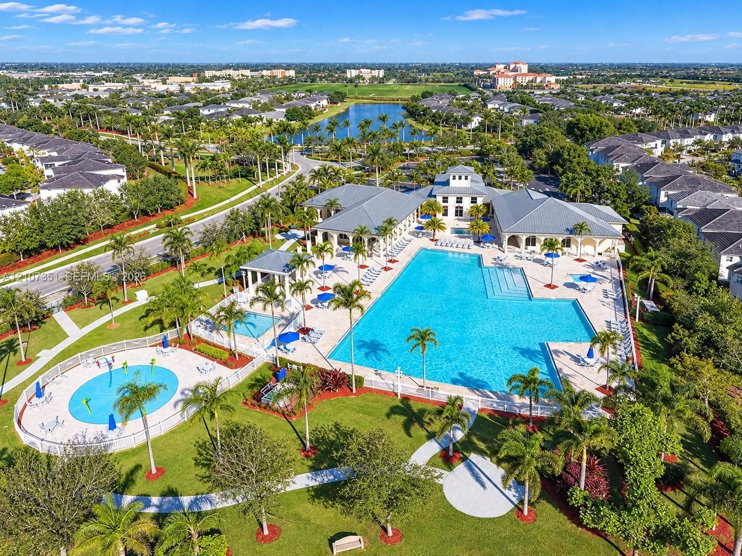 230 SE 29th Avenue, #1, Homestead, Homestead, FL 33033 Community recreation center featuring an expansive swimming pool, separate splash pad, covered pavilion, and surrounding landscaped grounds