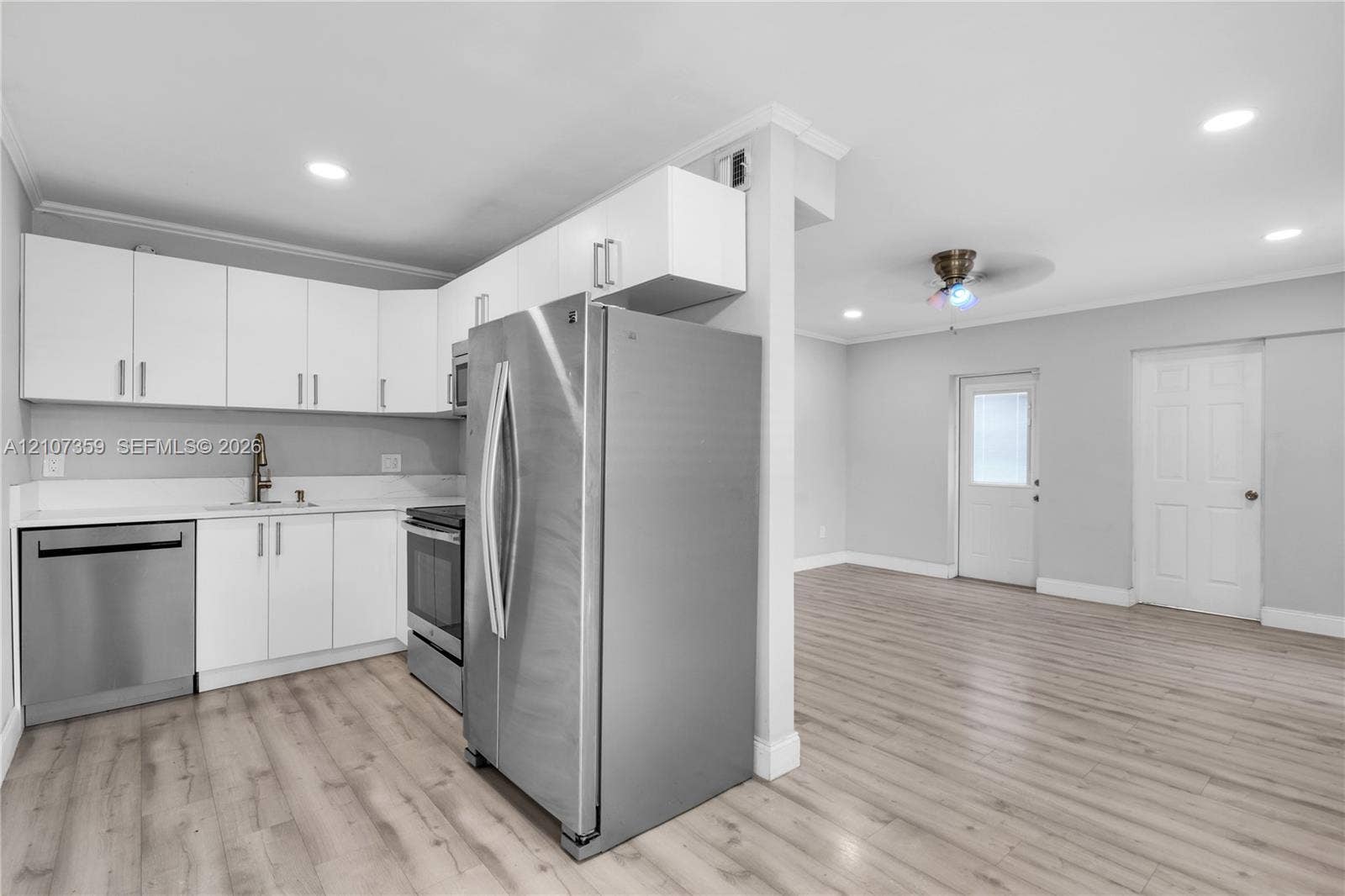 4500 NE 18th Avenue, Pompano Beach, Pompano Beach, FL 33064 Additional kitchen view showcasing ample counter space, stainless-steel appliances, and the open layout.