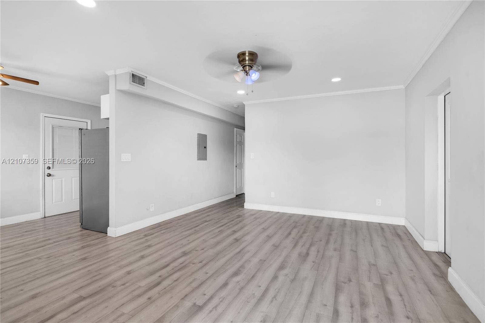 4500 NE 18th Avenue, Pompano Beach, Pompano Beach, FL 33064 Actual living room with updated flooring, natural light, and recessed lighting