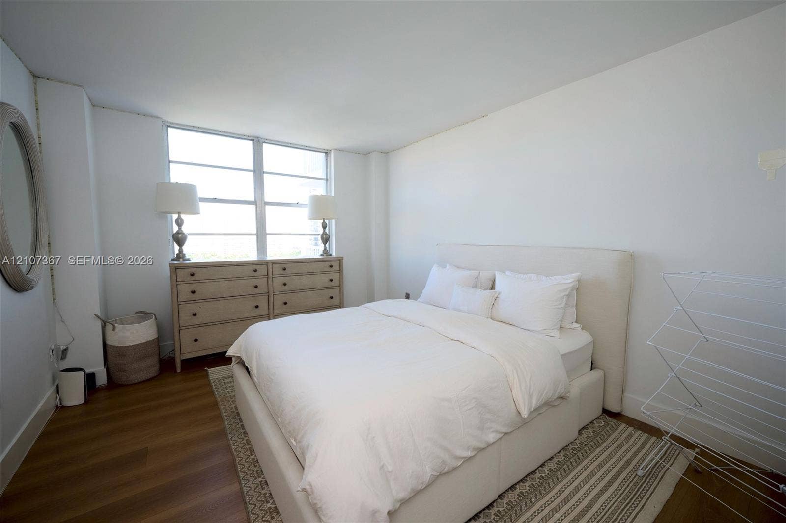2851 NE 183rd Street, #1617E, Aventura, FL 33160 Room featuring wood-finish flooring and large multi-pane windows