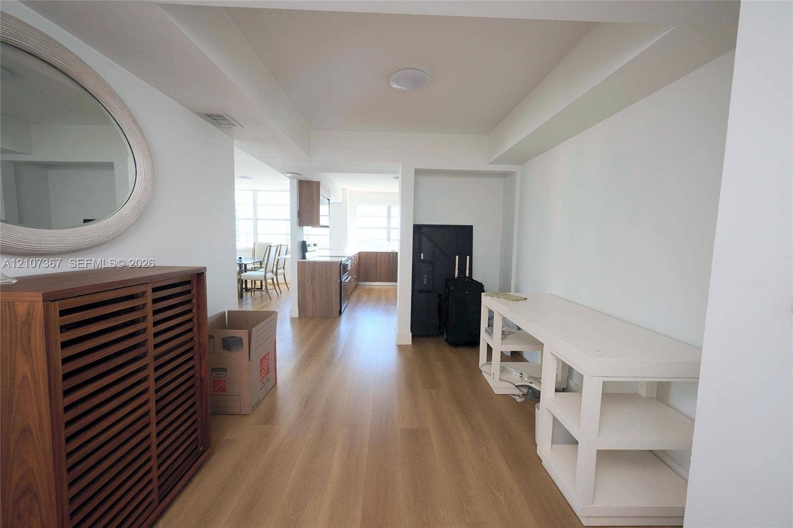 2851 NE 183rd Street, #1617E, Aventura, FL 33160 Interior space featuring wood-finish flooring, recessed ceiling lighting, and crisp white wall finishes