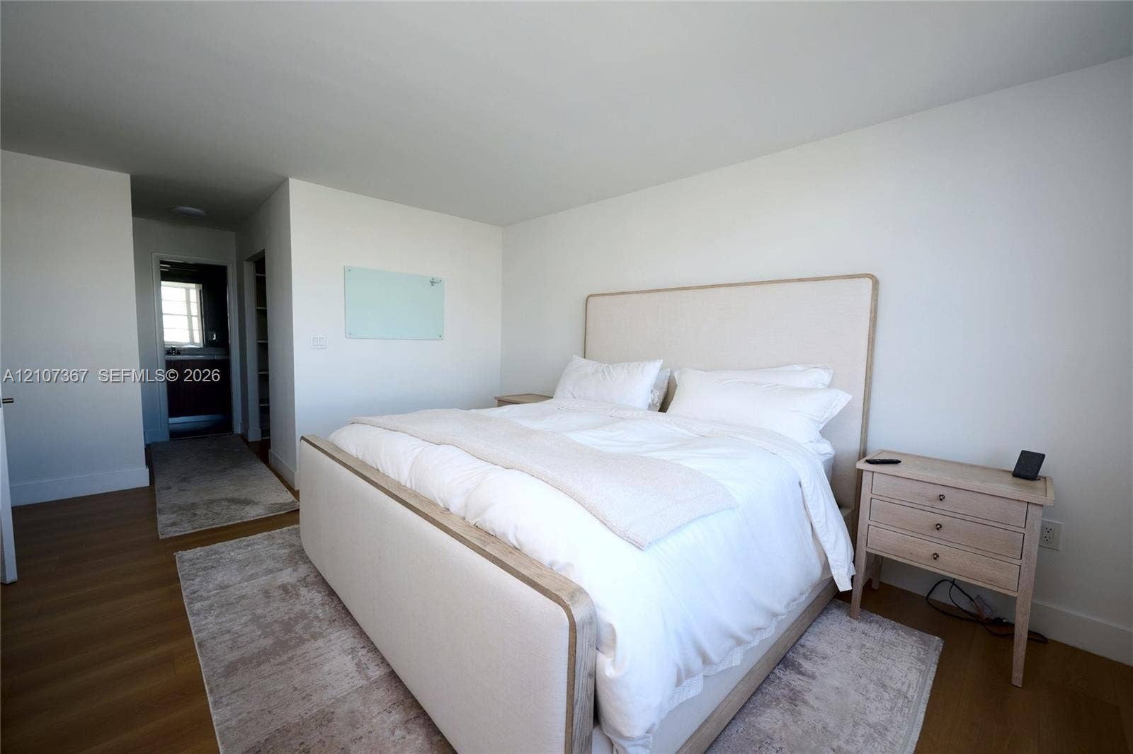 2851 NE 183rd Street, #1617E, Aventura, FL 33160 Neutral-toned wall finish with wood-finish flooring
