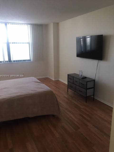 2301 S Ocean Drive, #1606, Hollywood, Hollywood, FL 33019 Wood-finish flooring and large-format windows with vertical blinds