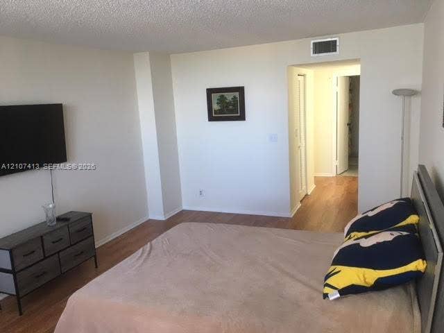2301 S Ocean Drive, #1606, Hollywood, Hollywood, FL 33019 Room featuring wood-finish flooring and neutral wall paint