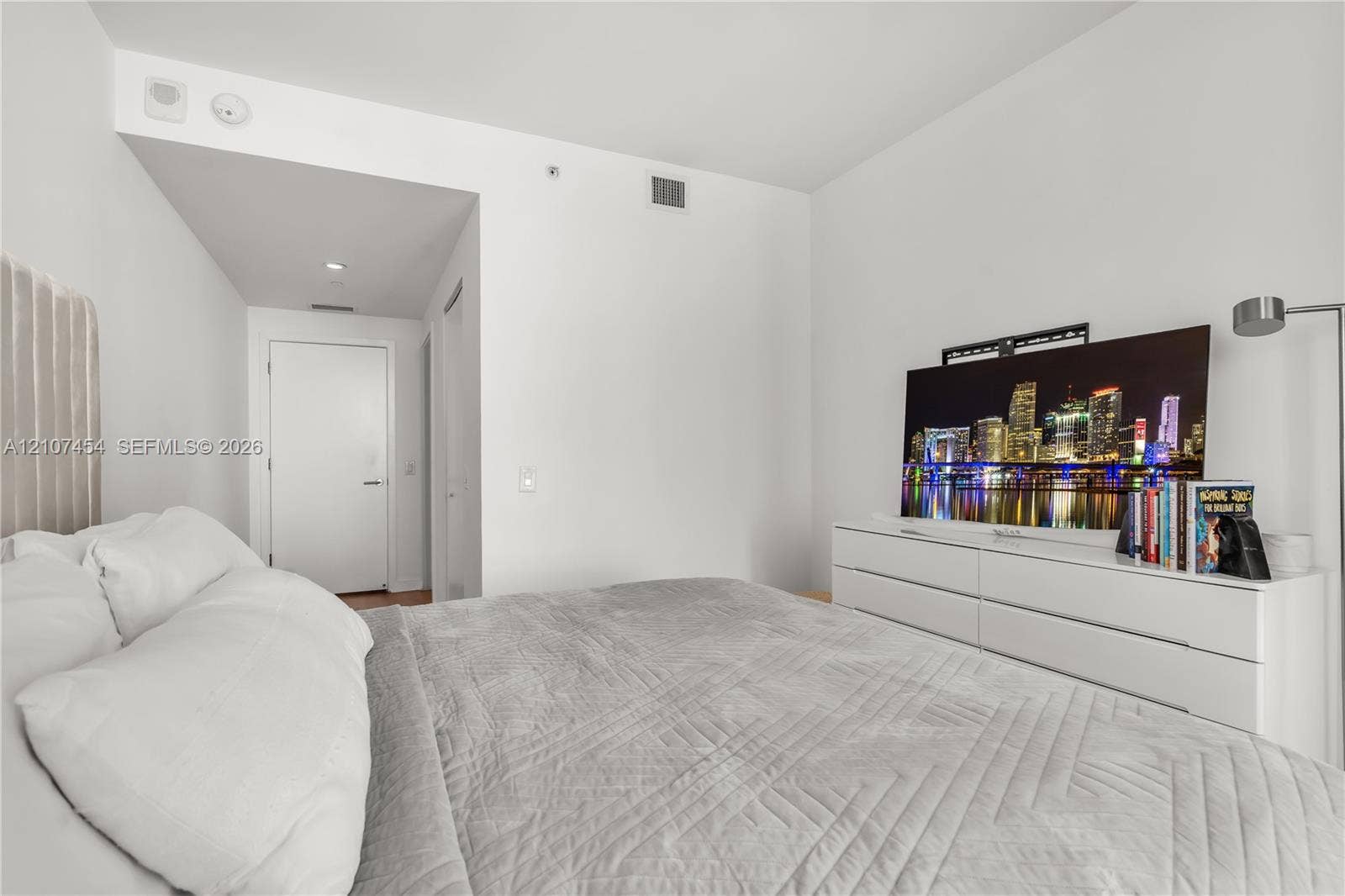 501 NE 31st Street, #1906, Miami, FL 33137 Neutral-toned interior space featuring recessed ceiling lighting, smooth white walls, and a dedicated hallway entry