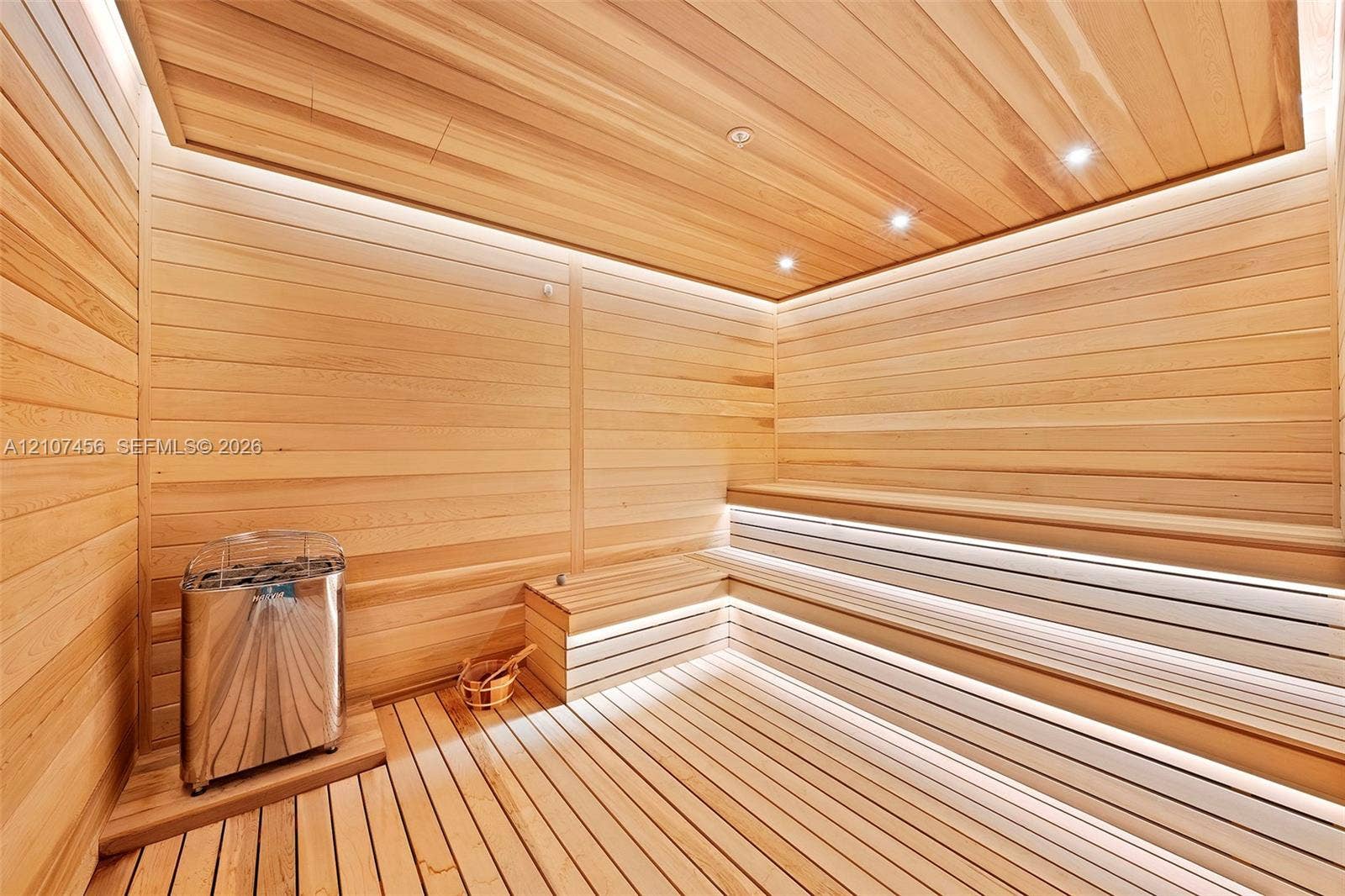 1400 Biscayne Boulevard, #2604, Miami, Miami, FL 33132 Sauna featuring tongue-and-groove wood paneling, multi-level built-in bench seating, recessed lighting, integrated LED strip lighting, and a stainless steel heater