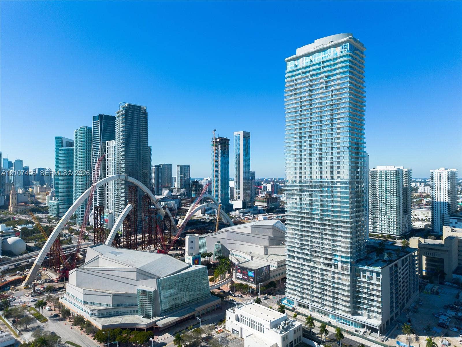 1400 Biscayne Boulevard, #2604, Miami, Miami, FL 33132 High-rise tower featuring glass-paneled exterior walls and stacked cantilevered balconies