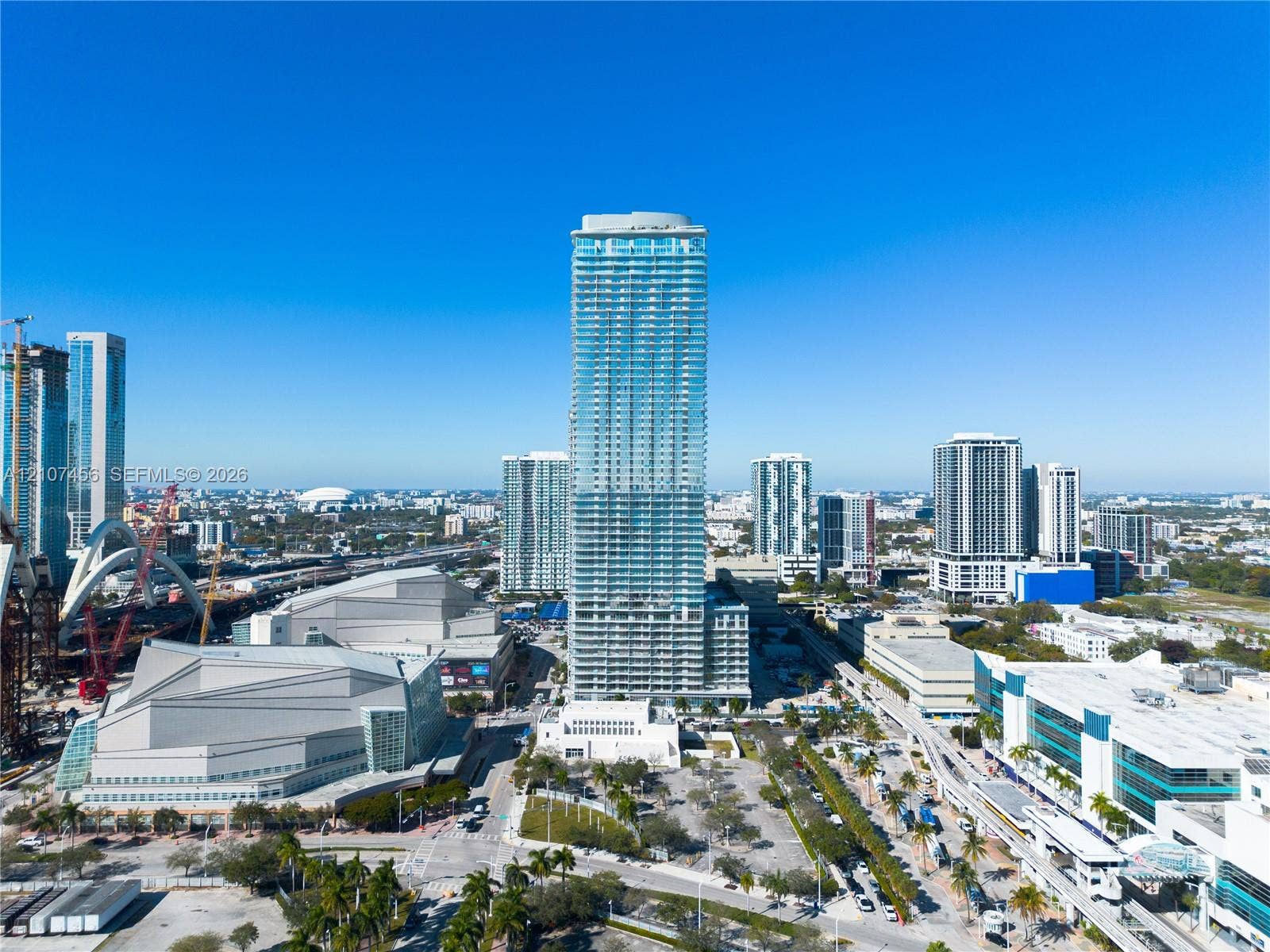 1400 Biscayne Boulevard, #2604, Miami, Miami, FL 33132 High-rise residential tower featuring a glass-curtain facade, wrap-around balconies, and a multi-level architectural design