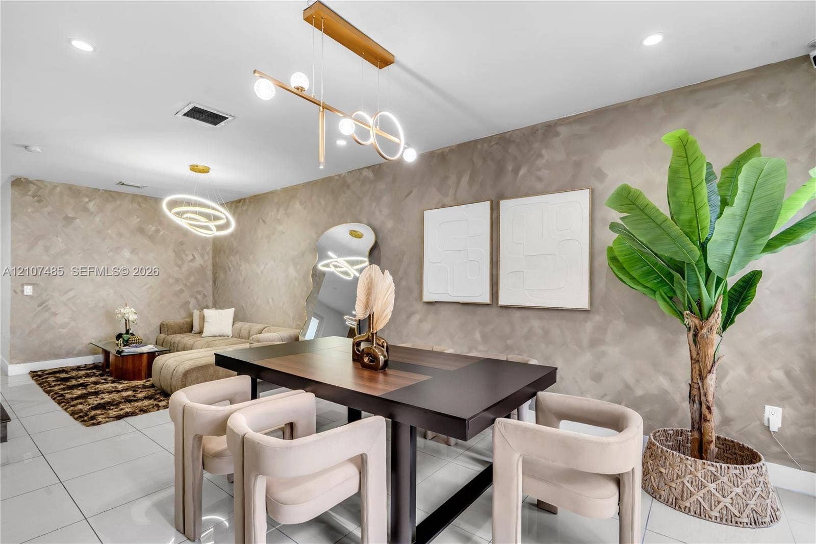 10545 NW 63rd Terrace, Doral, FL 33178 Textured wall finish, glossy tile flooring, recessed lighting, and contemporary metallic geometric light fixtures