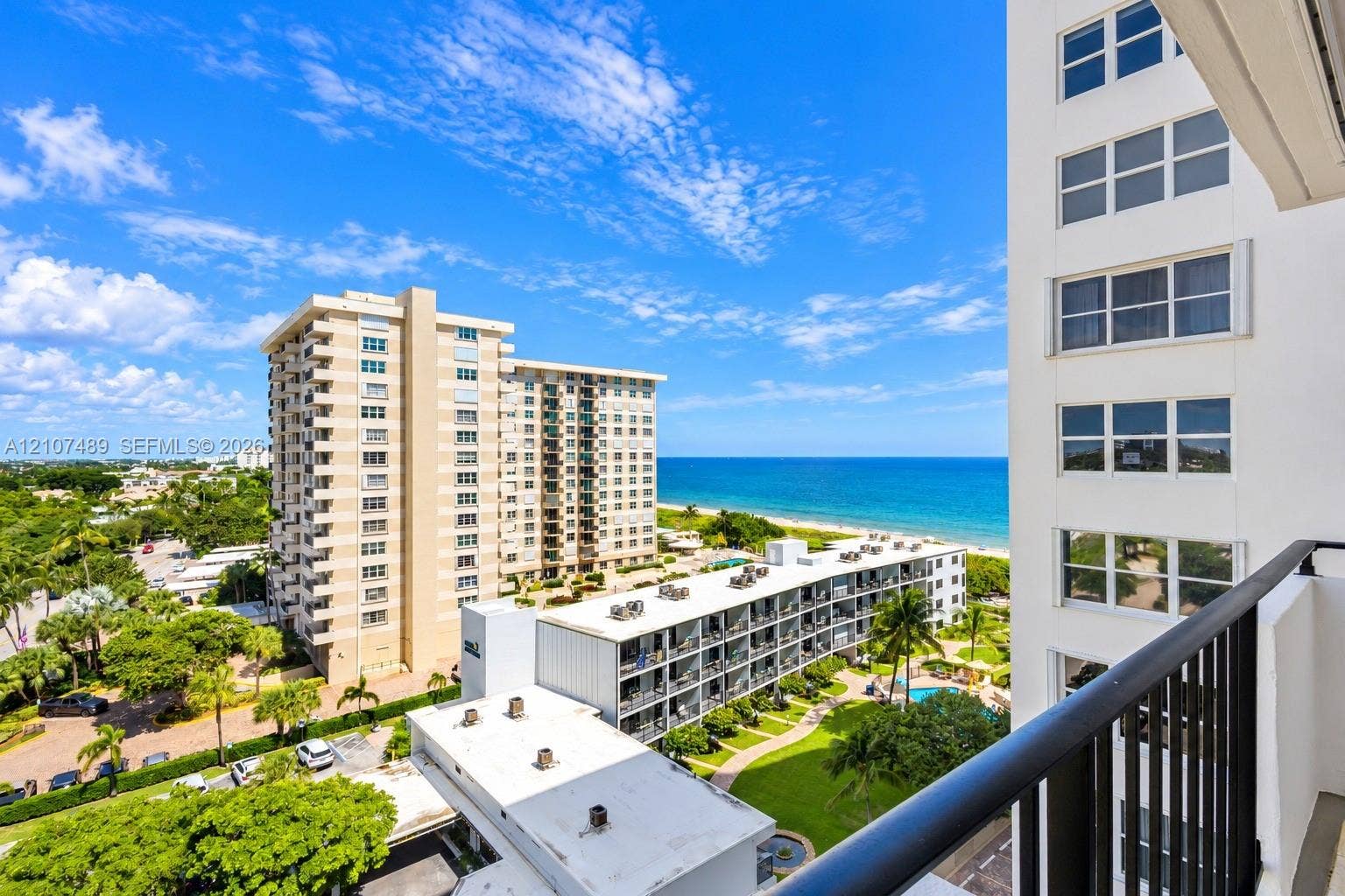 2000 S Ocean Boulevard, #9N, Lauderdale-By-The-Sea, Lauderdale By The Sea, FL 33062 Private balcony with black metal railing, featuring ocean and coastal landscape surroundings