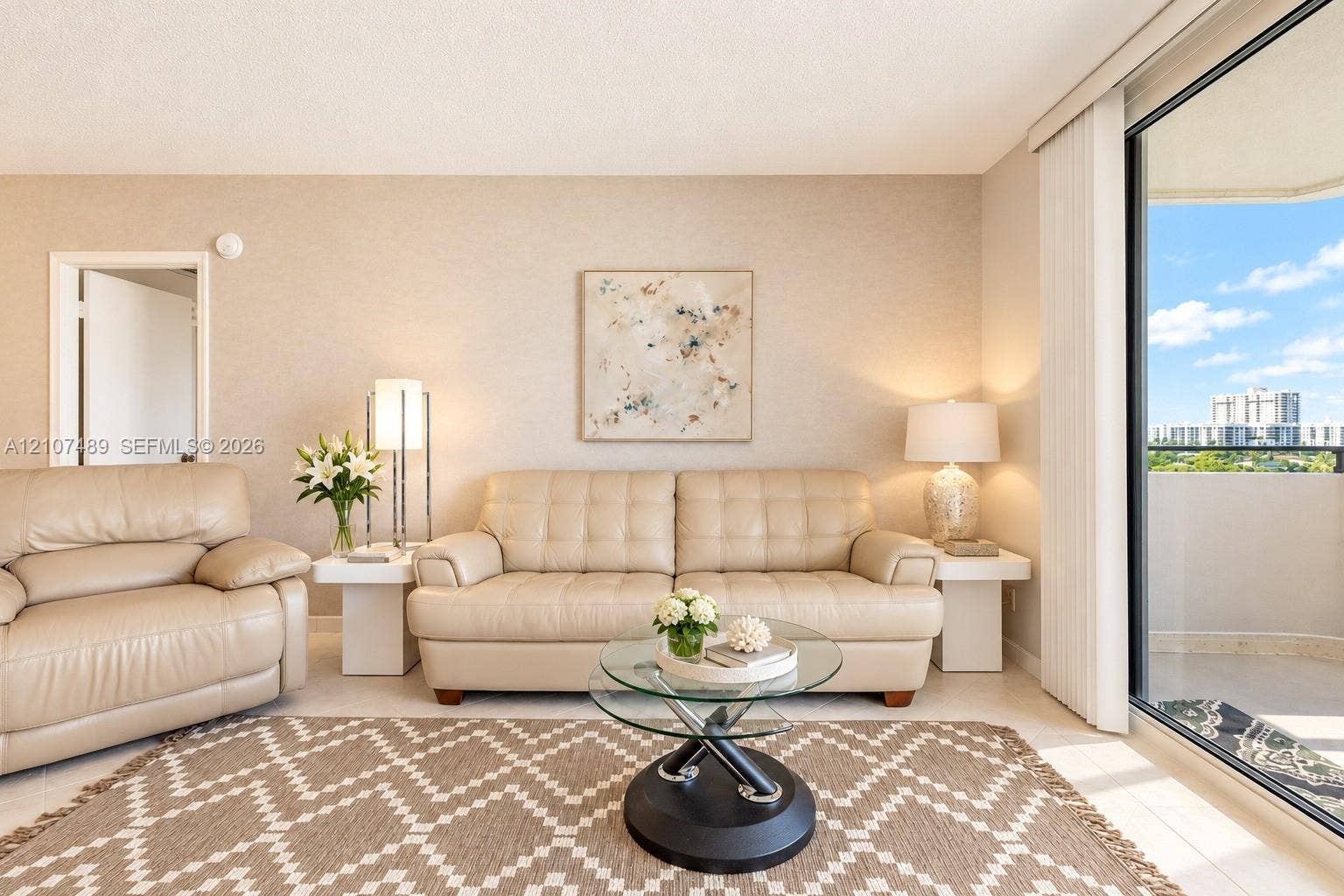 2000 S Ocean Boulevard, #9N, Lauderdale-By-The-Sea, Lauderdale By The Sea, FL 33062 Floor-to-ceiling sliding glass door, light-toned tile flooring, and neutral wall textures