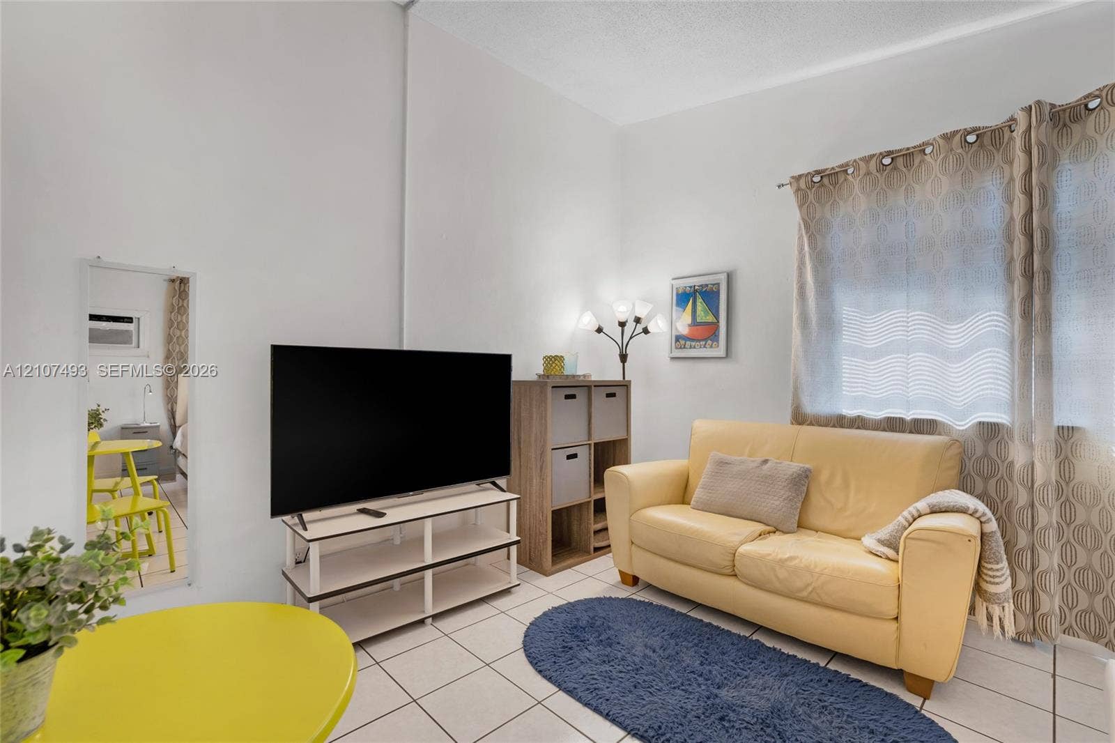 2645 NE 32nd Street, Fort Lauderdale, FL 33306 High ceilings with neutral wall finish and ceramic tile flooring