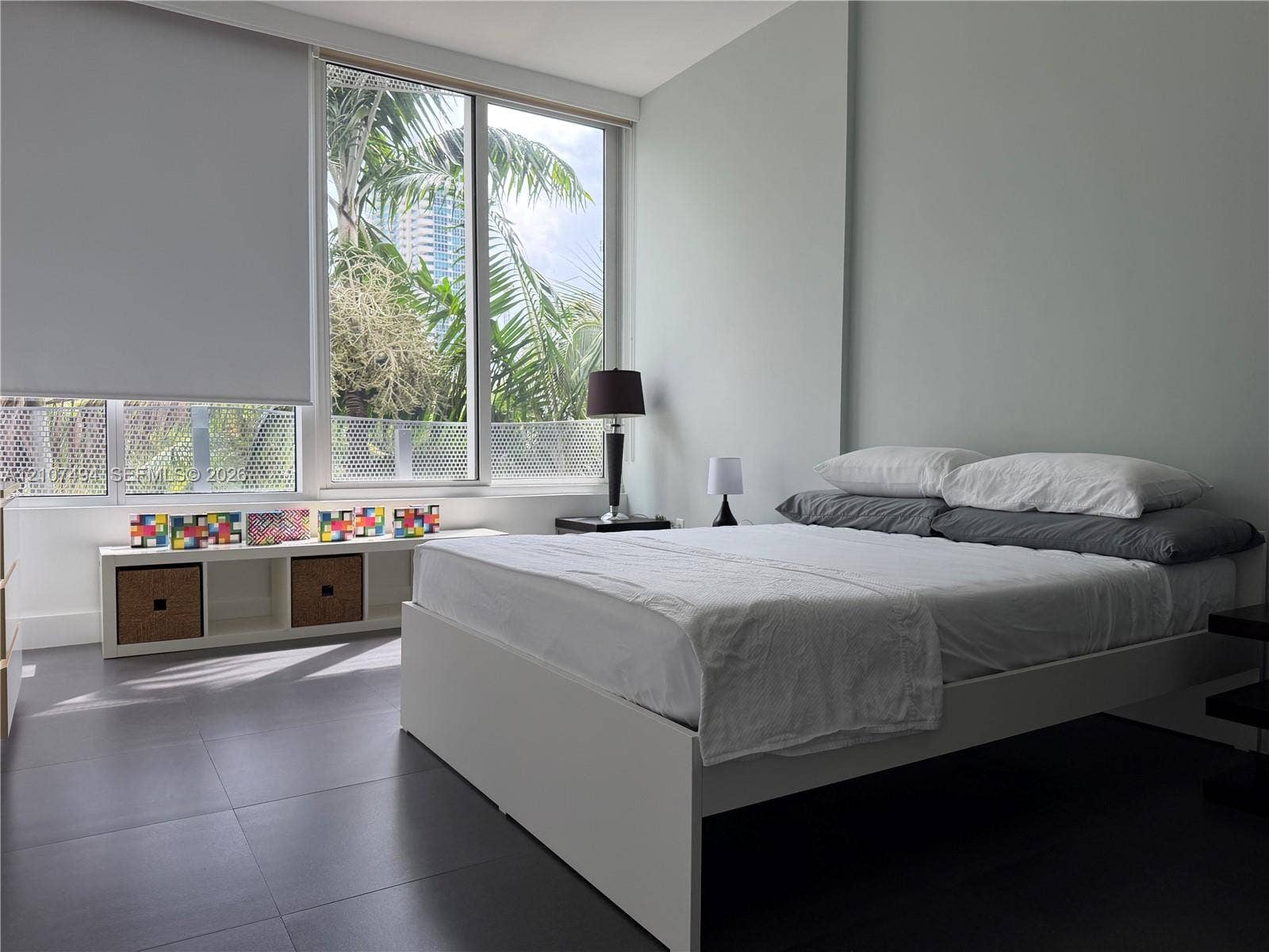 2100 Park Avenue, #305, Miami Beach, Miami Beach, FL 33139 Floor-to-ceiling windows, large-format tile flooring, neutral wall finish, and retractable window shades