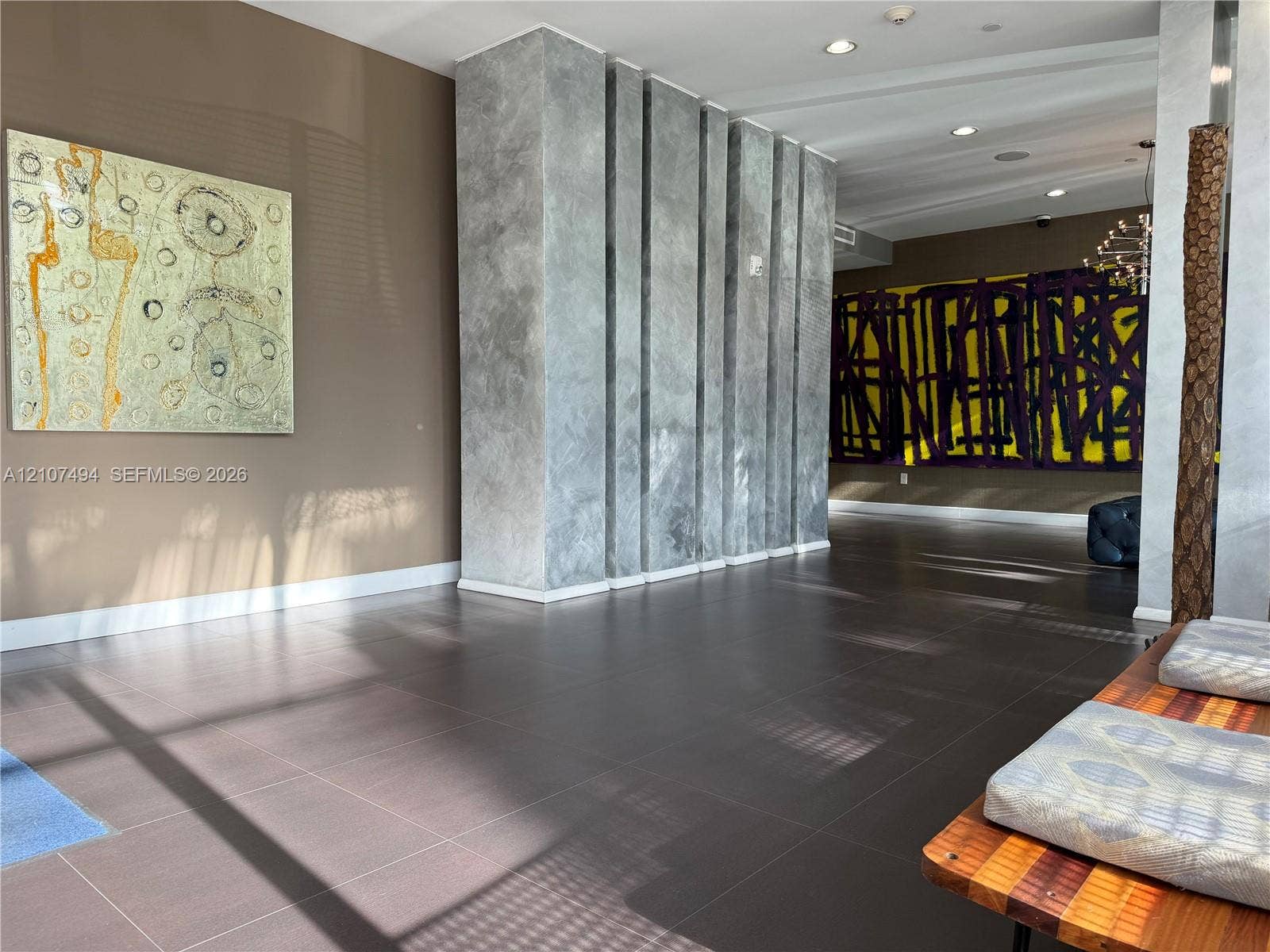 2100 Park Avenue, #305, Miami Beach, Miami Beach, FL 33139 Large-format tile flooring, textured architectural column with vertical detailing, and recessed ceiling lighting