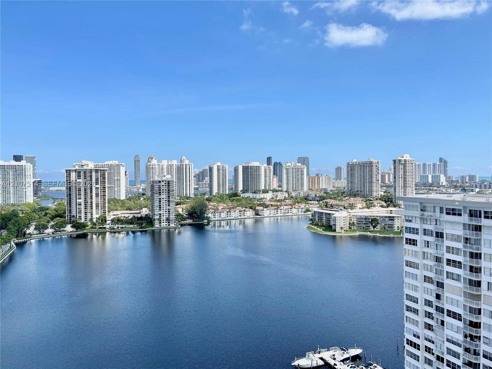 2750 NE 183rd Street, #2310, Aventura, Aventura, FL 33160 Elevated perspective featuring a expansive waterway, coastal skyline, and nautical docks