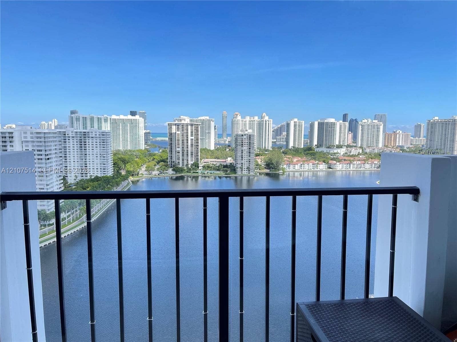 2750 NE 183rd Street, #2310, Aventura, Aventura, FL 33160 Balcony featuring a black metal railing and panoramic water and city skyline scenery
