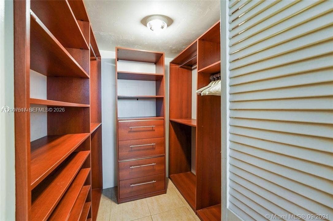 16531 NE 35th Avenue, #402-11, North Miami Beach, FL 33160 Master closet with custom builtins