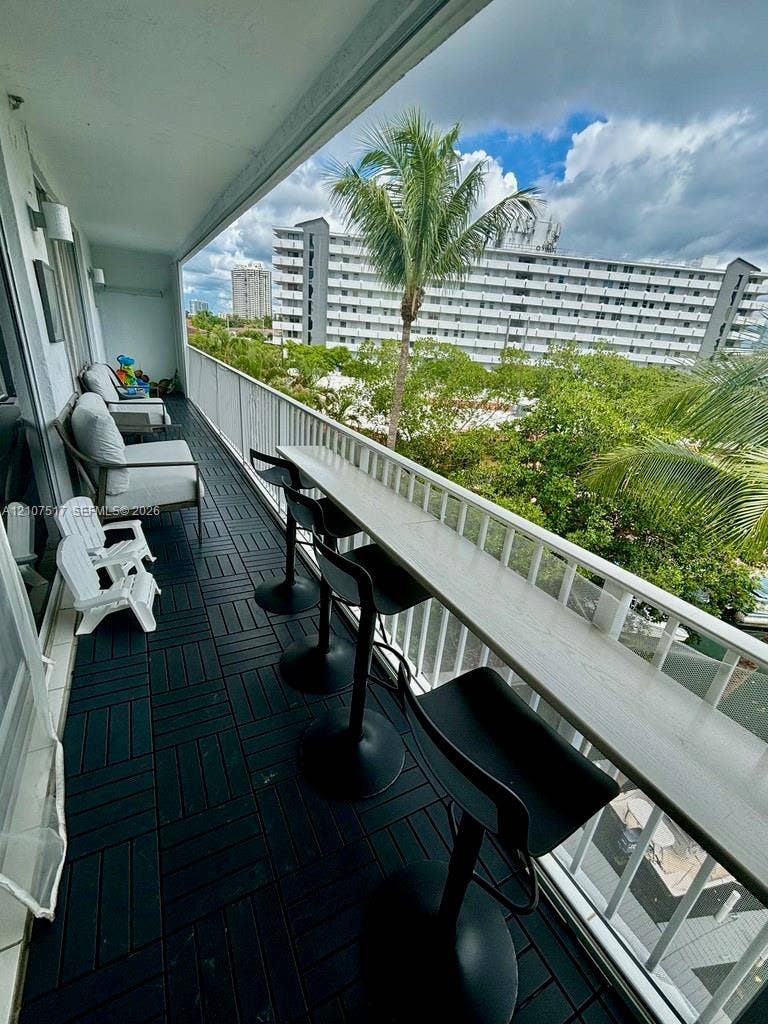 16531 NE 35th Avenue, #402-11, North Miami Beach, FL 33160 balcony bar seats four