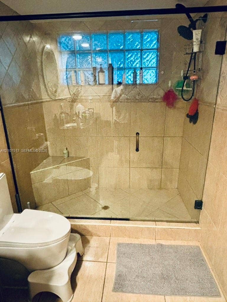 16531 NE 35th Avenue, #402-11, North Miami Beach, FL 33160 frameless glass