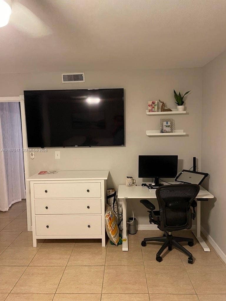 16531 NE 35th Avenue, #402-11, North Miami Beach, FL 33160 master bedroom with office desk space for remote workers