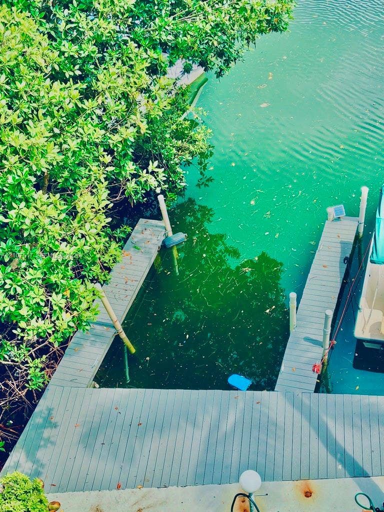 16531 NE 35th Avenue, #402-11, North Miami Beach, FL 33160 Private dock, you can bring your boat right away and enjoy. Fits floating docks as well