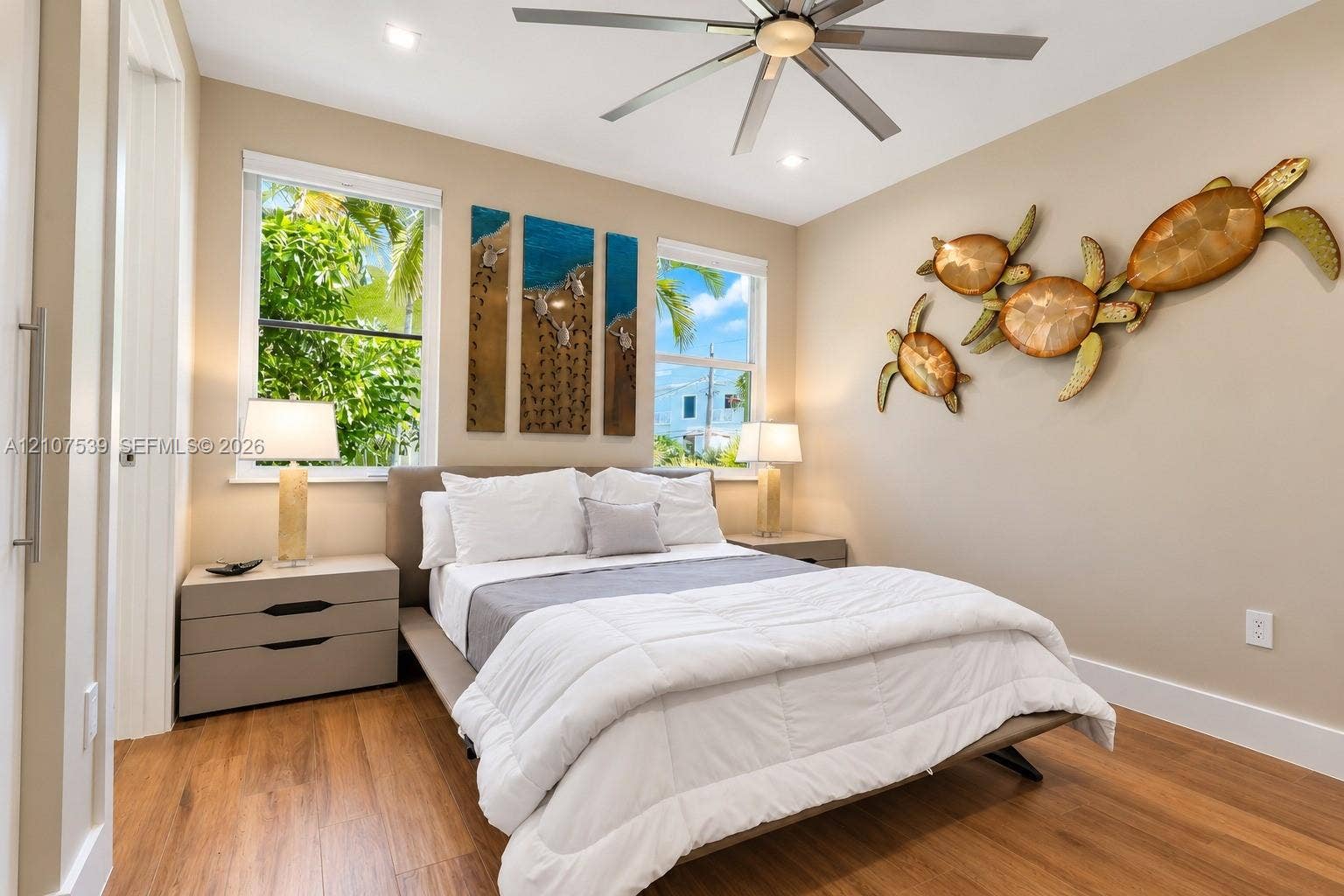 20 Center Lane, Key Largo, FL 33037 Bedroom featuring wood-finish flooring, recessed lighting, and a multi-blade ceiling fan