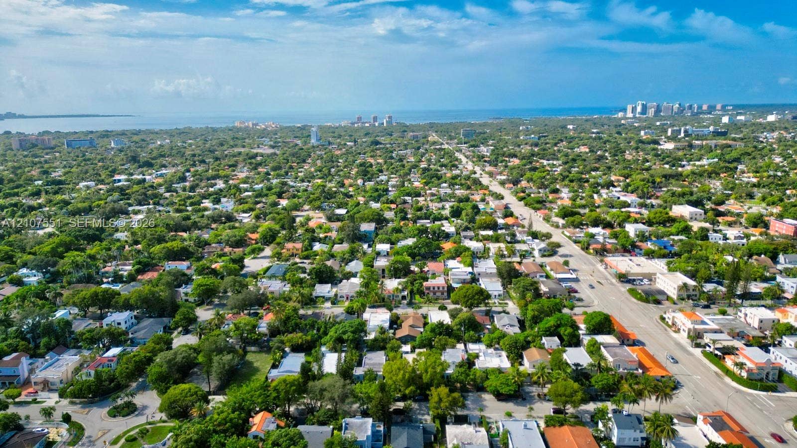 1676 SW 11th Street, Miami, Miami, FL 33135 Aerial perspective featuring mature tree canopy, dense residential landscaping, and coastal proximity